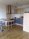 Kuchyň po pokládce podlah a instalaci kuchyňské linky